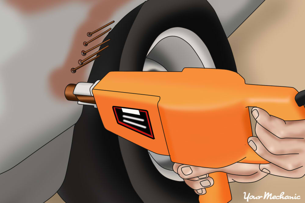 How to Fix a Dent with a Stud Welder Gun YourMechanic Advice