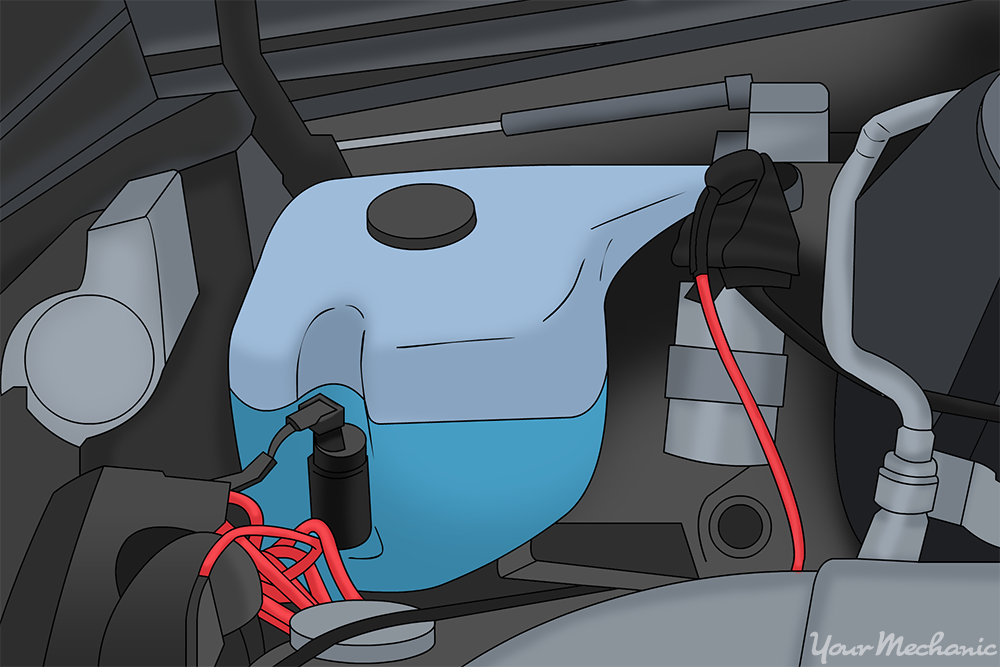 Windshield washer reservoir mounted to the inner fender with the washer pump motor visible